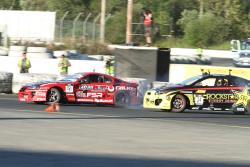 Fredric Aasbo battles Tanner Foust in 2010. Aasbo would join Papadakis Racing for the 2011 season