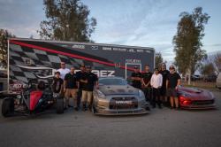 Narvaez Racing Team posing with their Ariel Atom, R35 Nissan GT-R, and Dodge Viper ACR