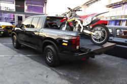 2017 Honda Ridgeline at the 2016 SEMA show with dirt bike in bed