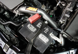 The factory PCV and MAF sensor mount directly on the aluminum intake tube.